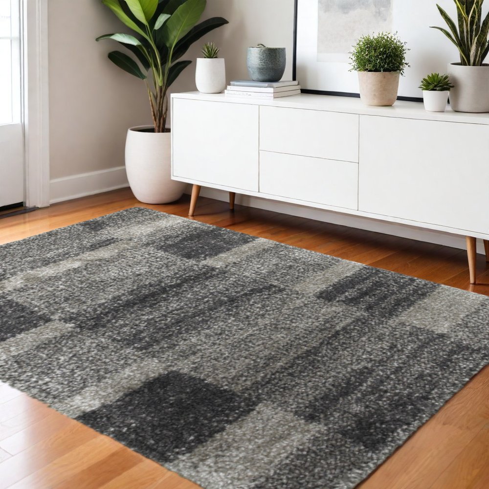 4' X 6' Charcoal Silver And Grey Geometric Shag Power Loom Stain Resistant Area Rug