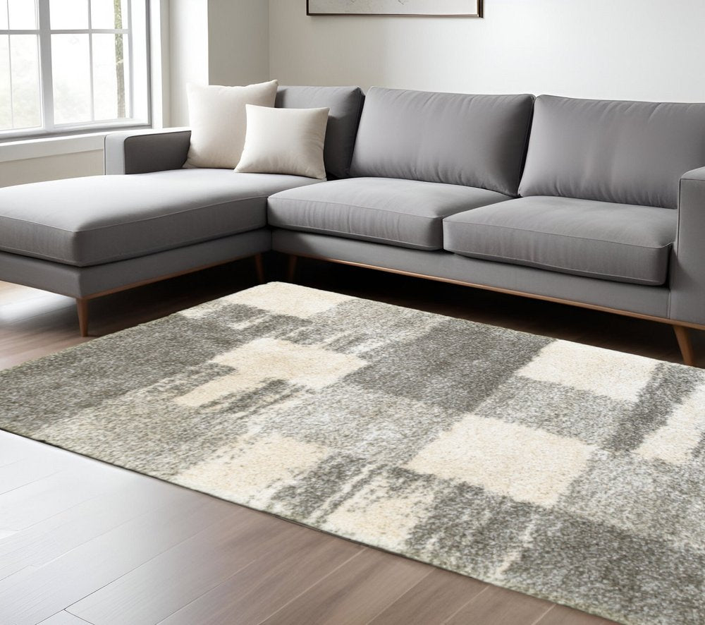 6' X 9' Grey Ivory And Silver Geometric Shag Power Loom Stain Resistant Area Rug