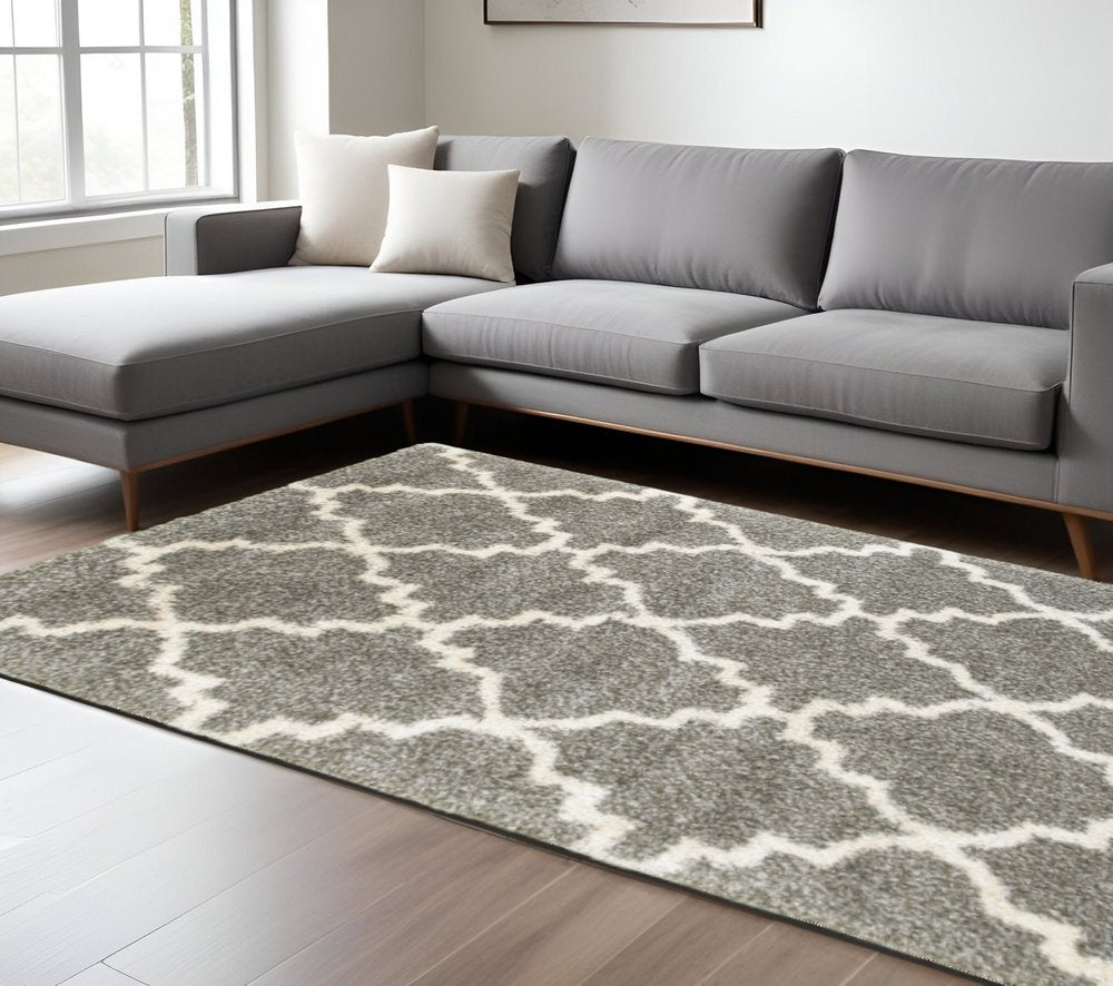 8' X 11' Grey And Ivory Geometric Shag Power Loom Stain Resistant Area Rug