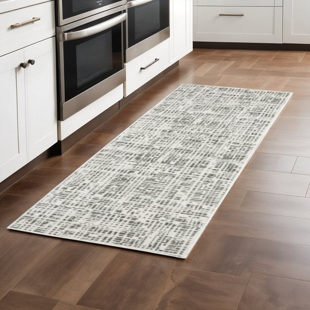 2' X 8' White And Grey Abstract Power Loom Stain Resistant Runner Rug