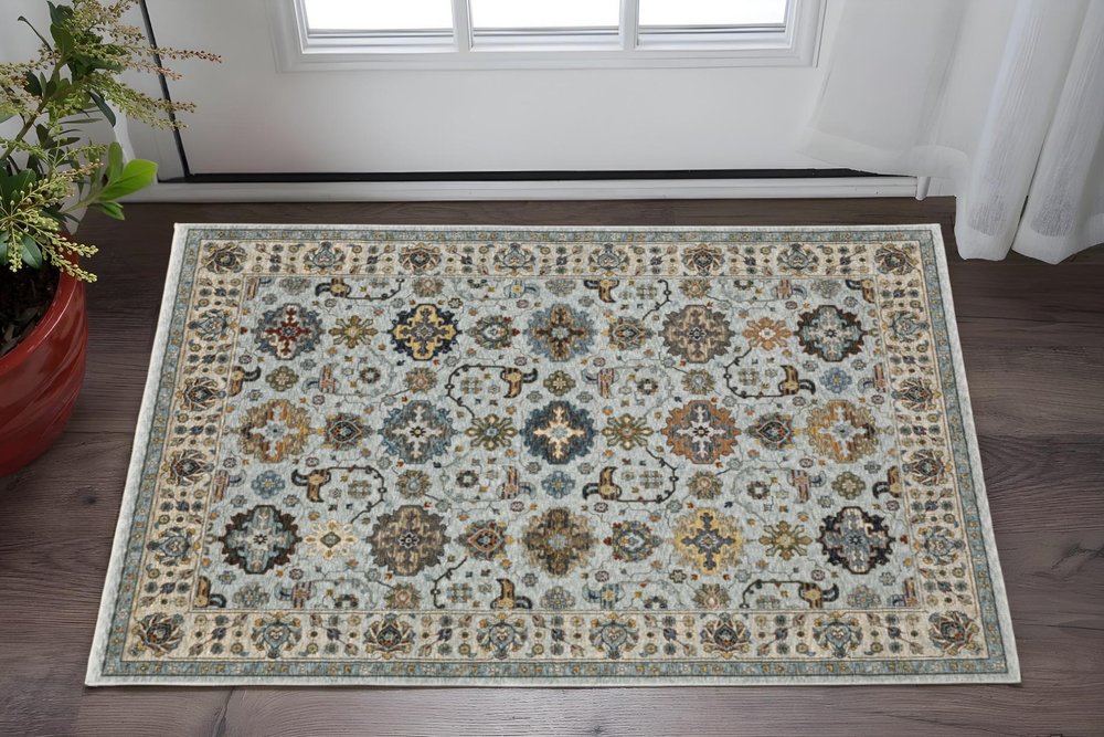 2' X 3' Blue Beige Grey Green Yellow And Rust Oriental Power Loom Stain Resistant Area Rug With Fringe
