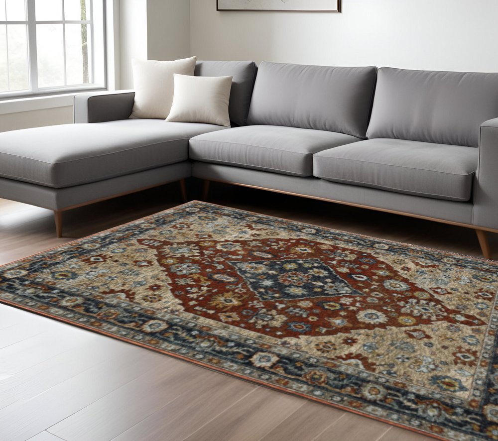 10' X 13' Blue Beige Tan Brown Gold And Rust Red Oriental Power Loom Stain Resistant Area Rug With Fringe