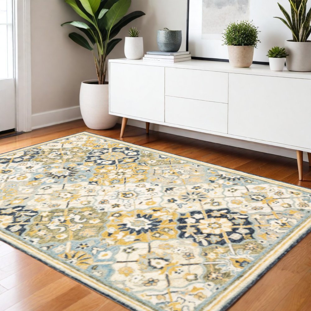 4' X 6' Blue Green Gold Navy And Ivory Geometric Tufted Handmade Stain Resistant Area Rug