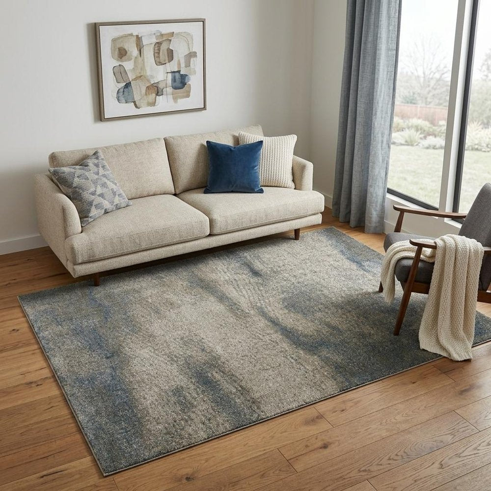 5' X 8' Beige And Blue Abstract Distressed Area Rug