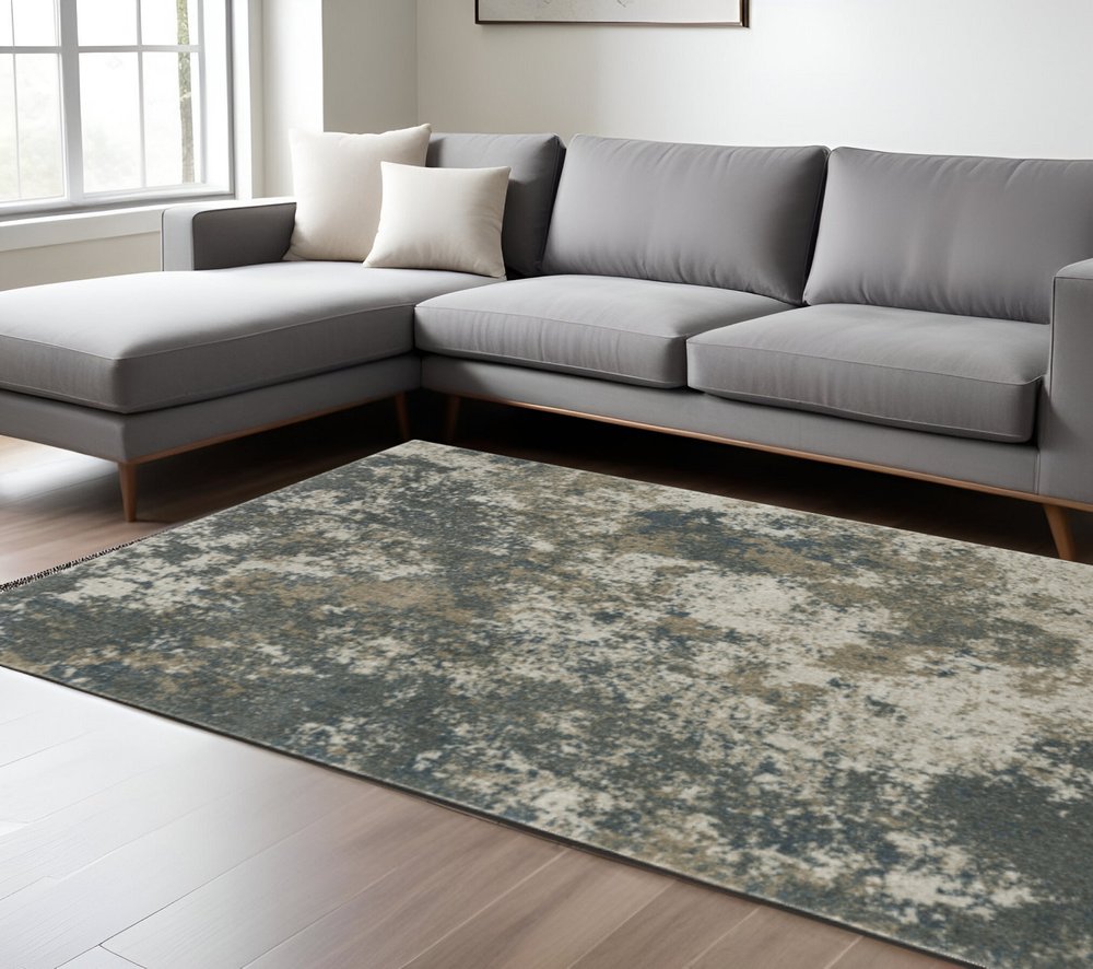 7' X 10' Tan and Gray Abstract Power Loom Area Rug