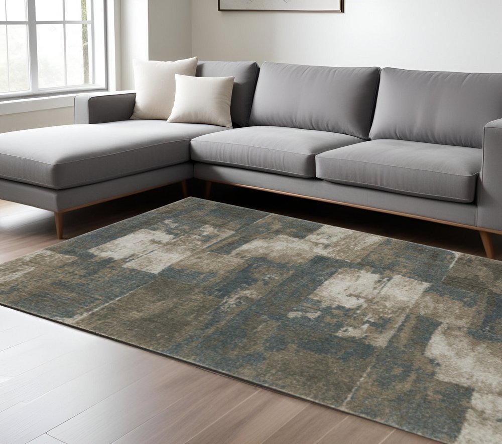 7' X 10' Teal Blue Geometric Power Loom Area Rug
