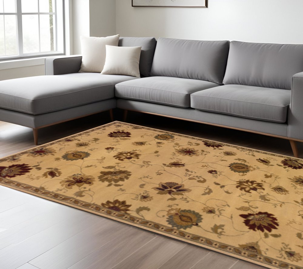 10' X 13' Ivory Green Brown Blue And Rust Floral Power Loom Stain Resistant Area Rug