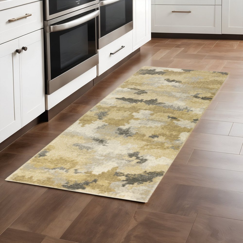 2' X 8' Beige Grey And Gold Abstract Power Loom Stain Resistant Runner Rug