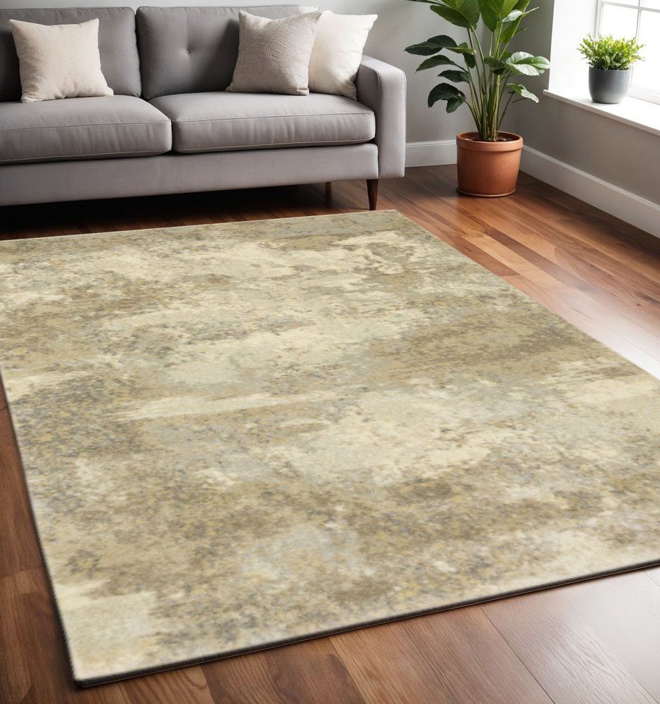 5' X 8' Beige and Gold Abstract Power Loom Area Rug