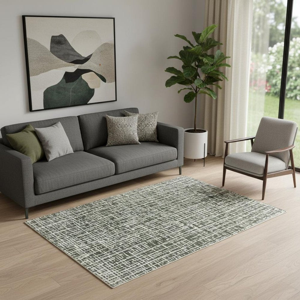 5' X 8' Grey And Ivory Abstract Power Loom Stain Resistant Area Rug