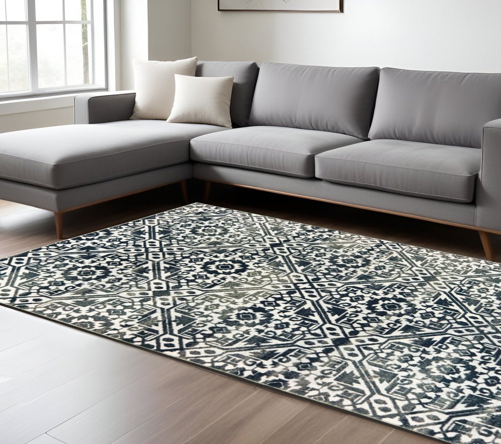 8' X 11' Navy Blue And Ivory Geometric Distressed Area Rug