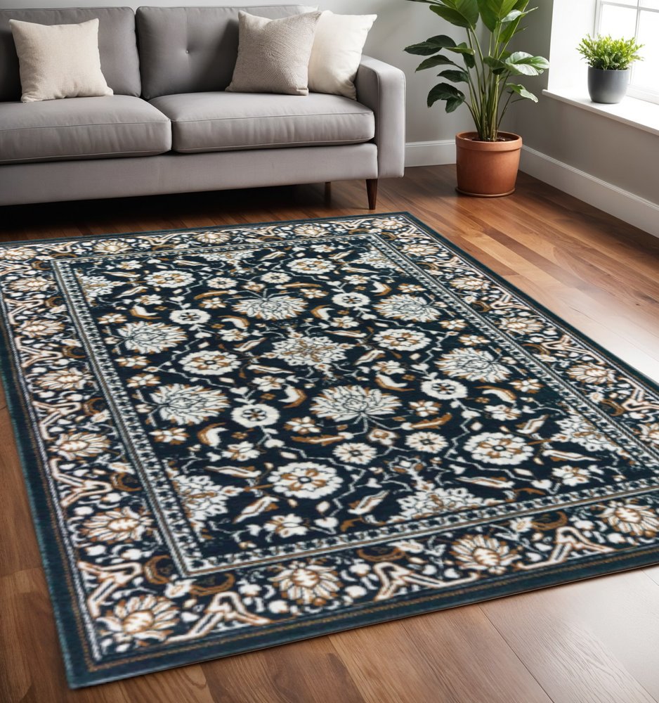 5' X 8' Navy Caramel And Ivory Oriental Power Loom Stain Resistant Area Rug