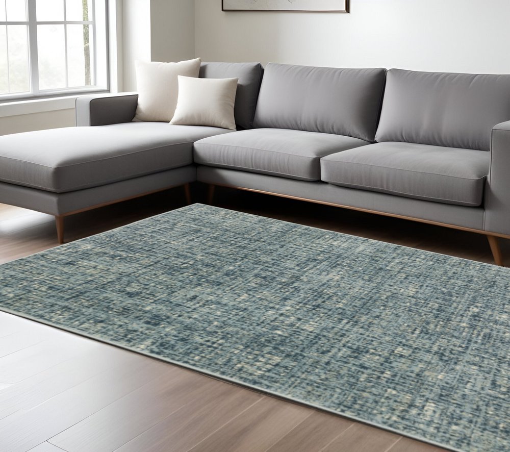7' X 9' Blue And Beige Abstract Area Rug