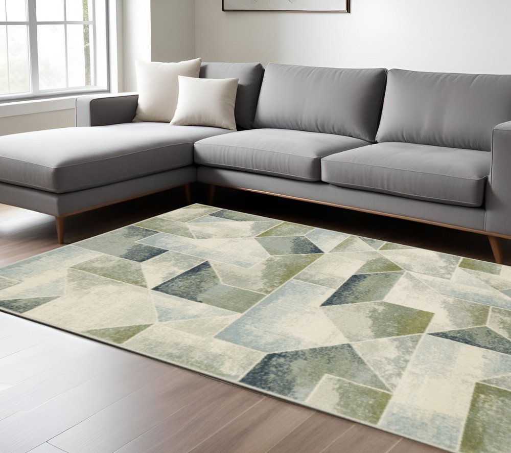 7' X 9' Gray And Ivory Geometric Area Rug