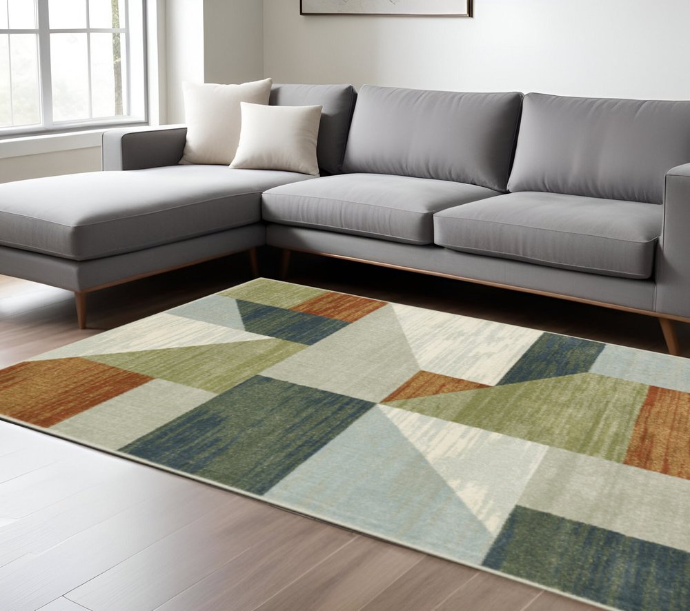 10' X 13' Grey Teal Blue Rust Green And Ivory Geometric Power Loom Stain Resistant Area Rug