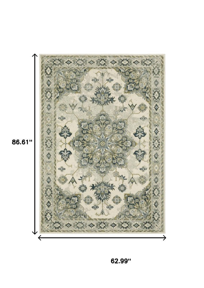 5' X 7' Ivory Blue Teal Grey And Olive Green Oriental Power Loom Stain Resistant Area Rug