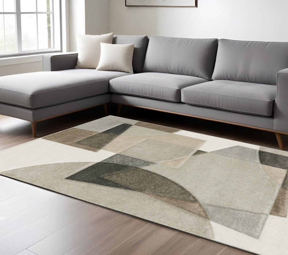 6' X 9' Beige Geometric Power Loom Stain Resistant Area Rug