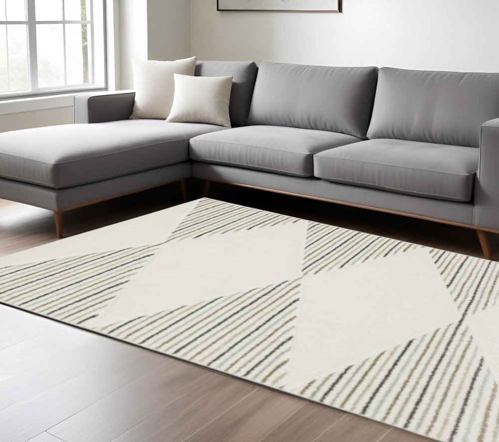 10' X 13' Beige Grey Sage Green Pale Blue Brown And Charcoal Geometric Power Loom Stain Resistant Area Rug