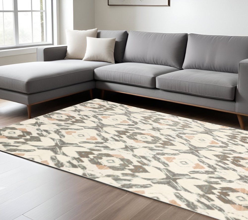10' x 13' ivory pink and sage geometric power loom stain-resistant area rug