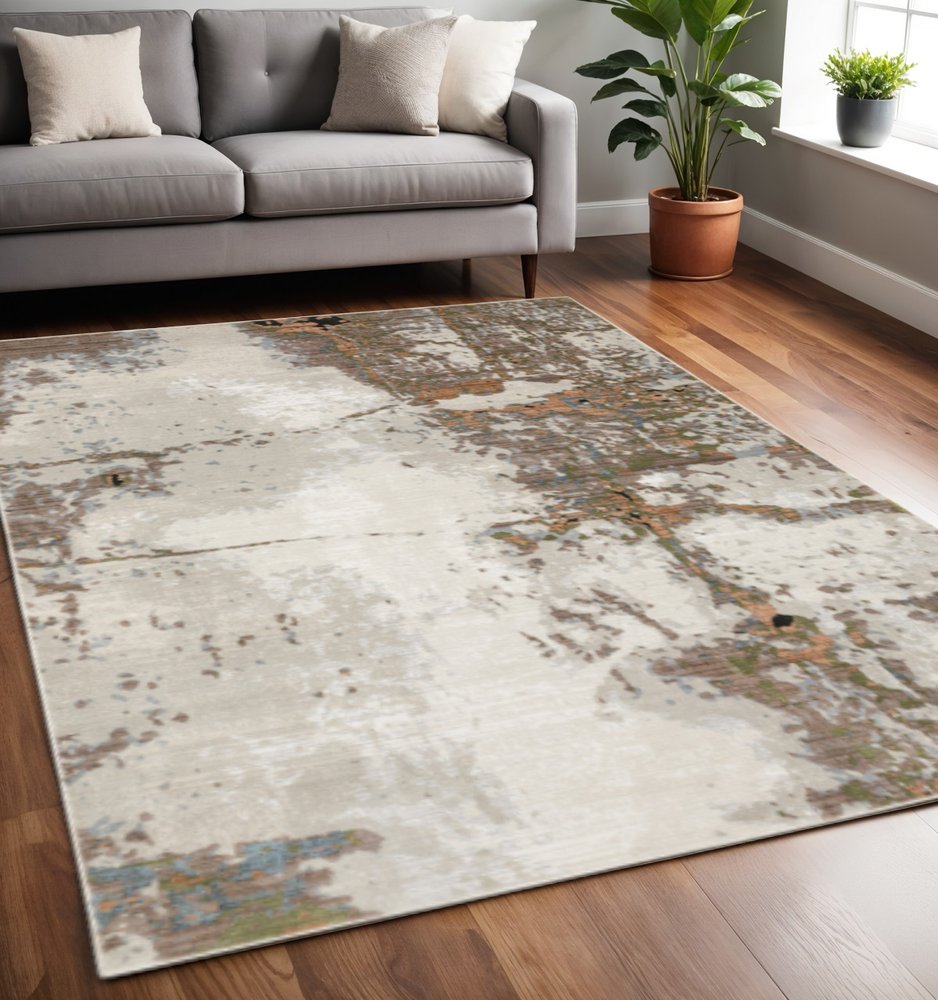 5' X 8' Grey Salmon Pink Blue Beige And Green Abstract Power Loom Stain Resistant Area Rug