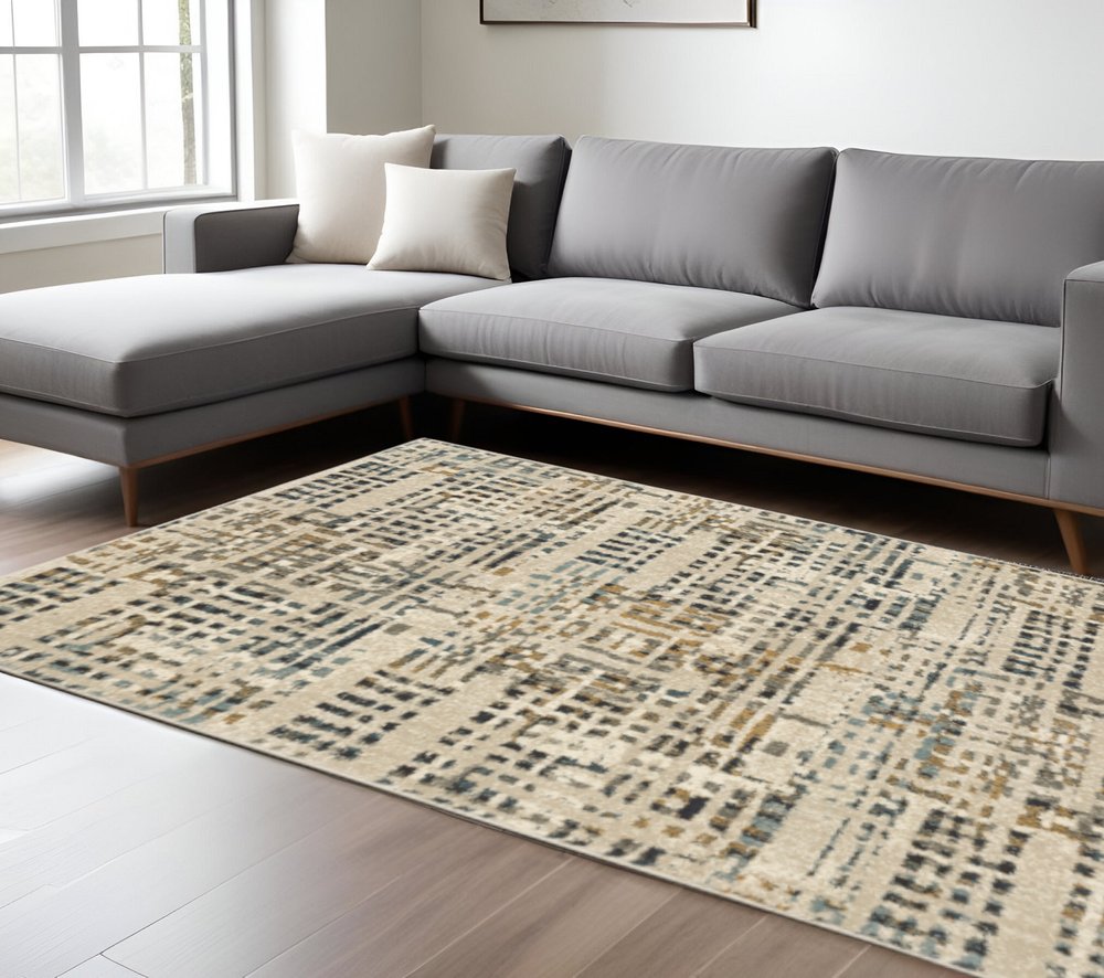 10' X 13' Beige Grey Blues Orange Yellow And Ivory Abstract Power Loom Stain Resistant Area Rug