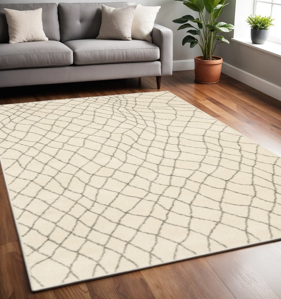 5' X 7' Ivory And Grey Geometric Power Loom Stain Resistant Area Rug
