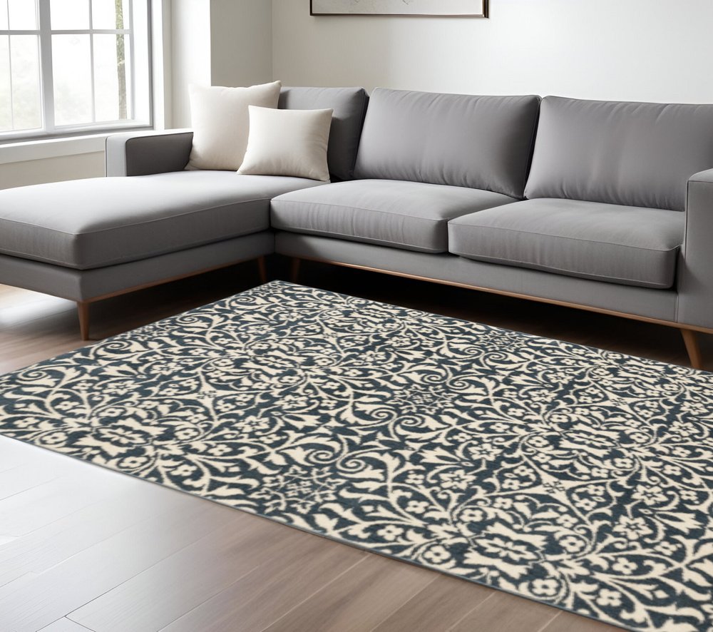 10' X 13' Blue And Ivory Floral Power Loom Stain Resistant Area Rug