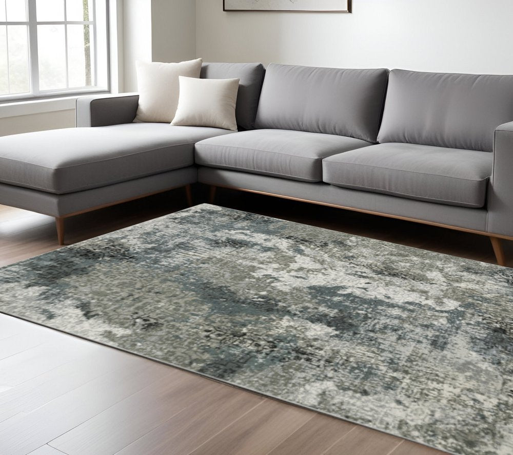 8' X 11' Ivory Grey Charcoal Blue And Navy Abstract Power Loom Stain Resistant Area Rug