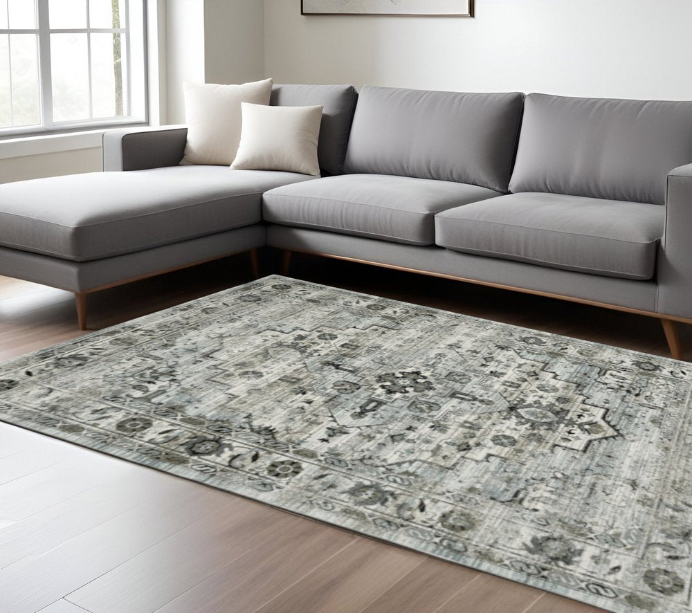 8' X 11' Ivory Grey Charcoal Blue And Taupe Oriental Power Loom Stain Resistant Area Rug