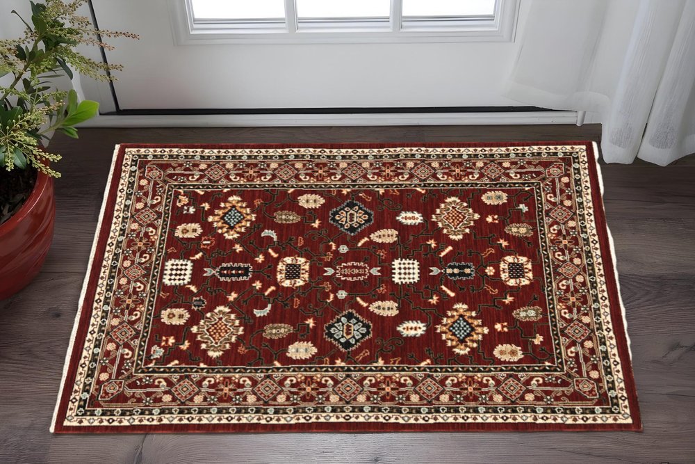 2' X 3' Red Black Ivory And Brown Oriental Power Loom Stain Resistant Area Rug With Fringe
