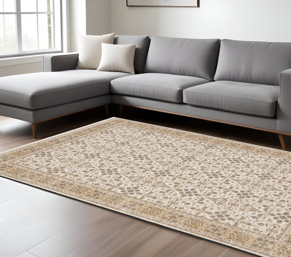 8' X 11' Ivory And Gold Oriental Area Rug With Fringe