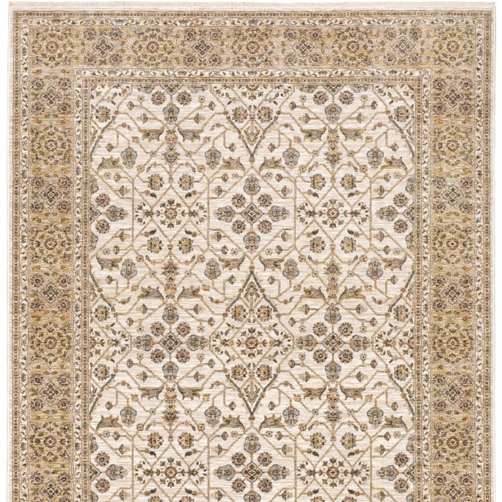 10' X 13' Ivory And Gold Oriental Power Loom Stain Resistant Area Rug With Fringe