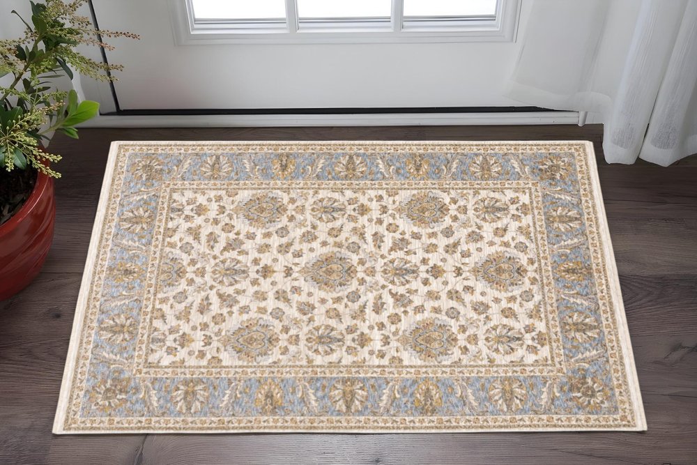 2' X 3' Ivory And Blue Oriental Power Loom Stain Resistant Area Rug With Fringe