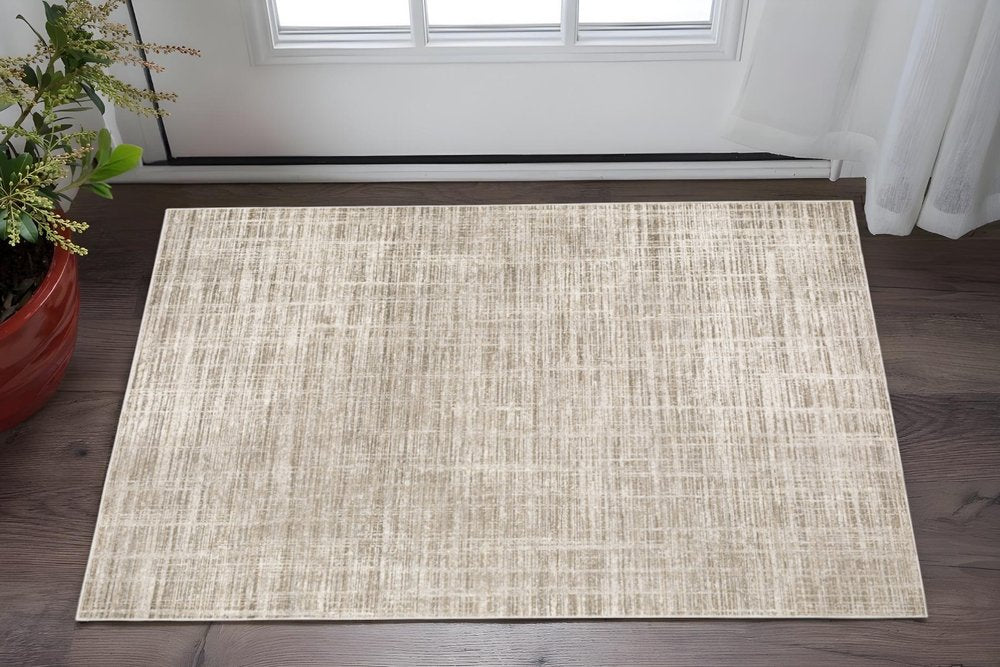 3' X 5' Beige Grey Ivory Tan And Brown Abstract Power Loom Stain Resistant Area Rug