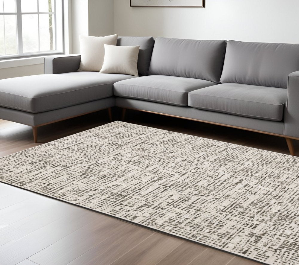 8' X 11' Ivory And Gray Abstract Area Rug