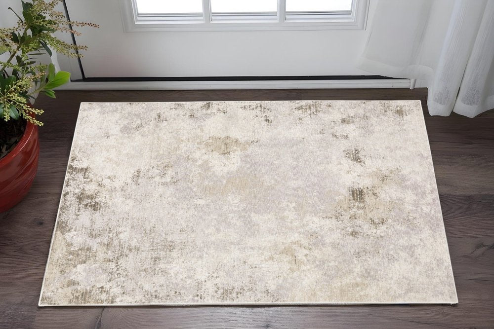 3' X 5' Beige Ivory Tan Grey And Brown Abstract Power Loom Stain Resistant Area Rug
