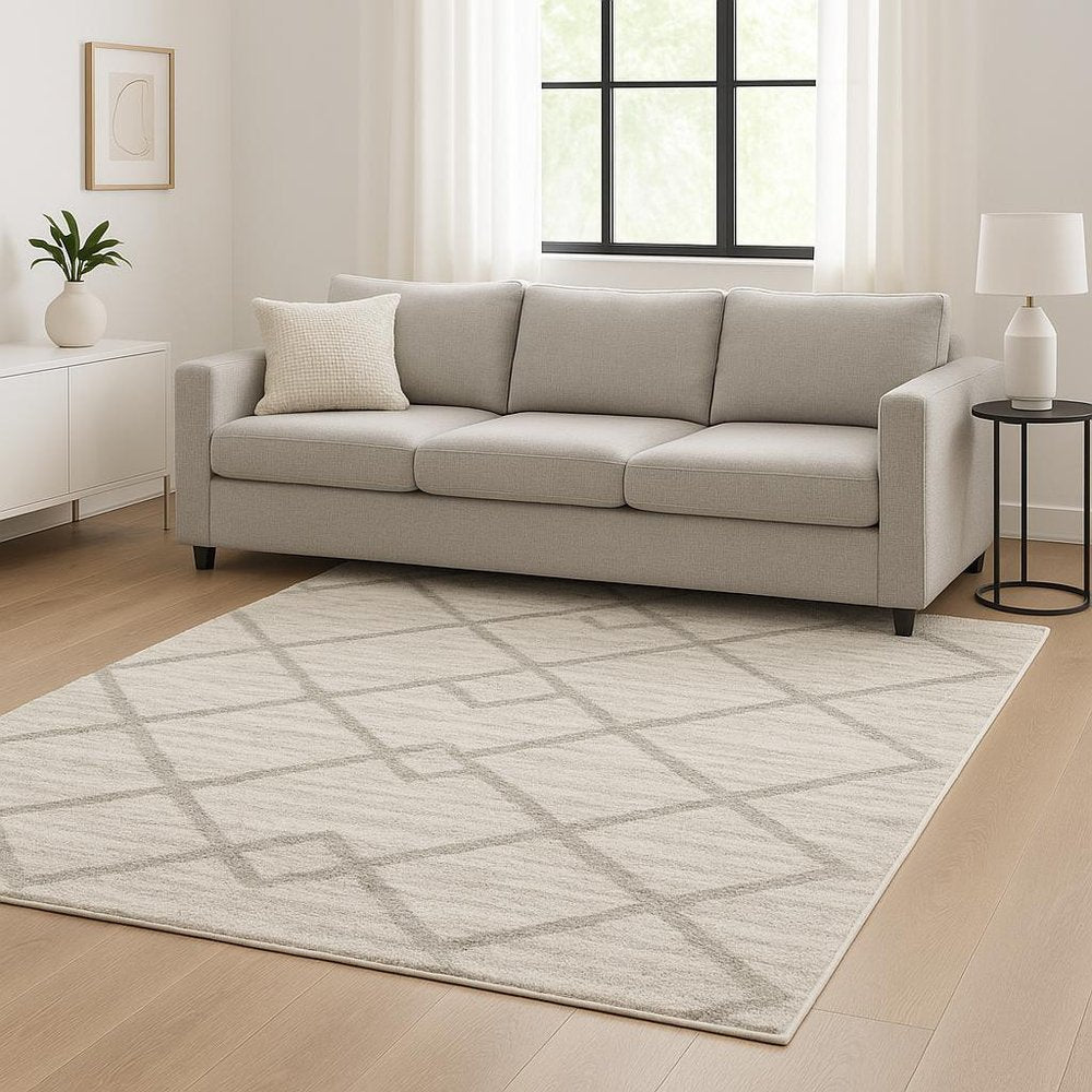 6' X 9' Ivory And Grey Geometric Shag Power Loom Stain Resistant Area Rug
