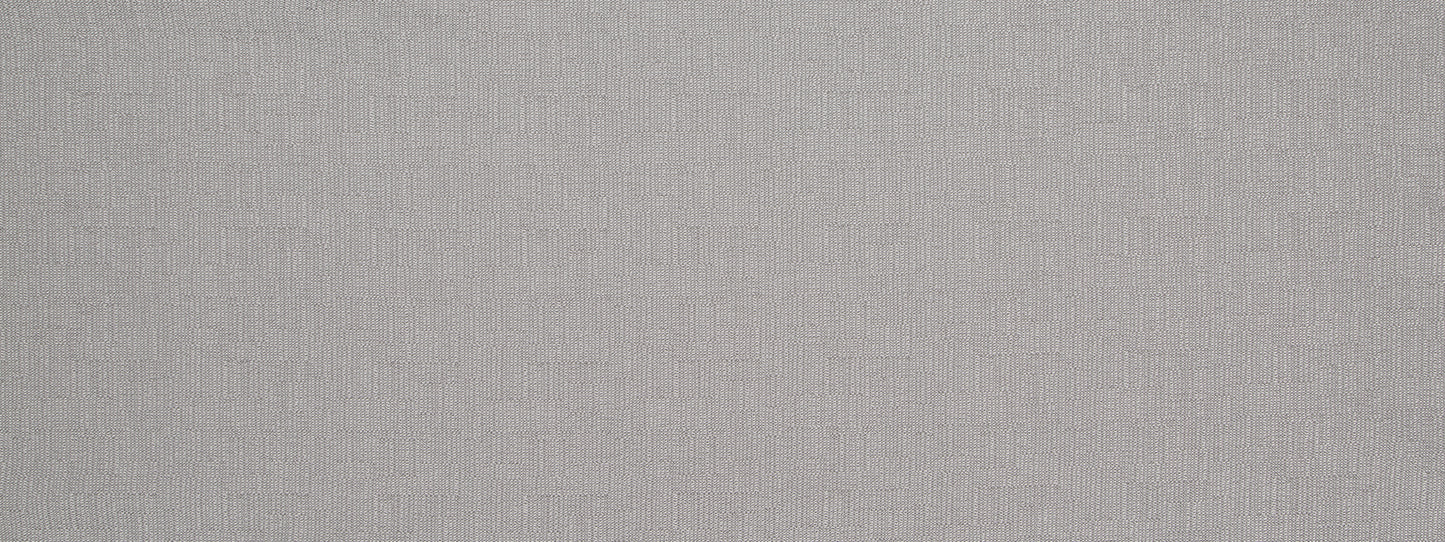 Light gray plush upholstery fabric texture with a soft surface.