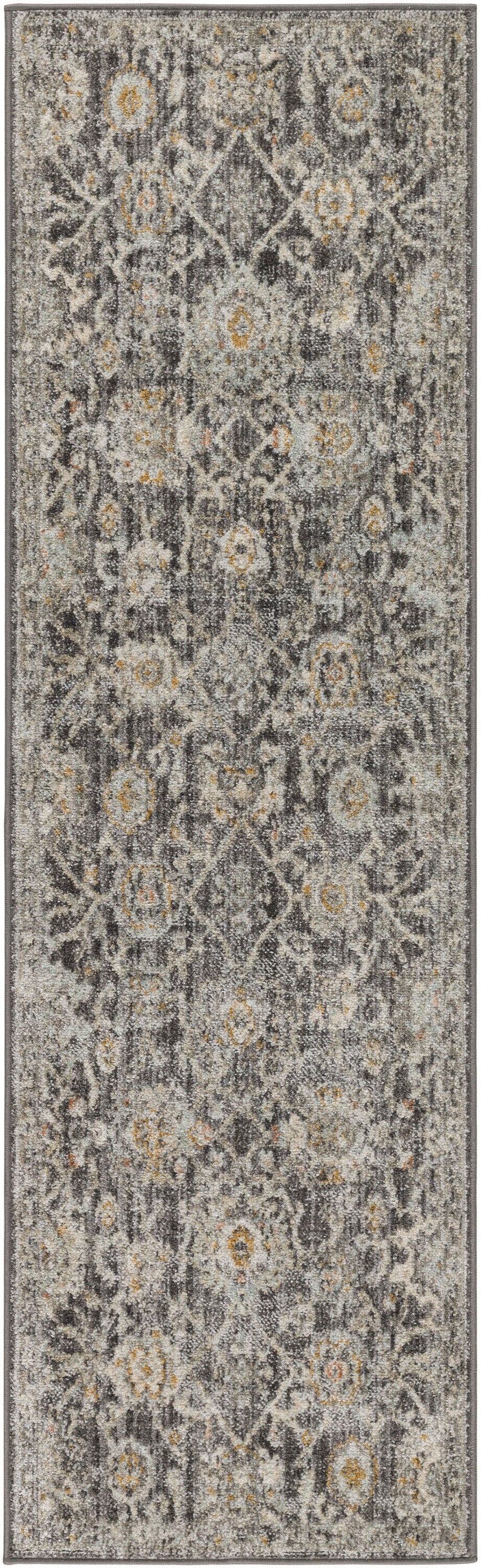 Long rectangular rug with a distressed gray/charcoal background, cream and ochre floral medallion pattern and border.