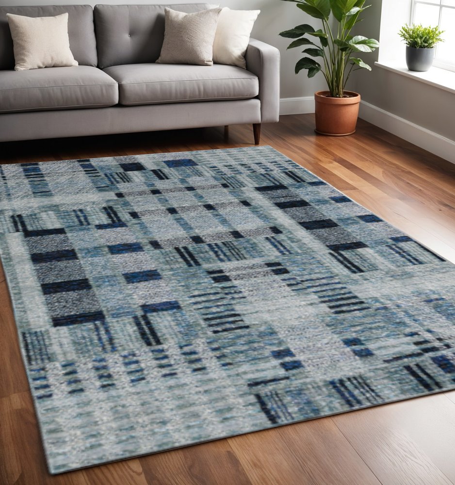 5' x 7' blue geometric power loom area rug