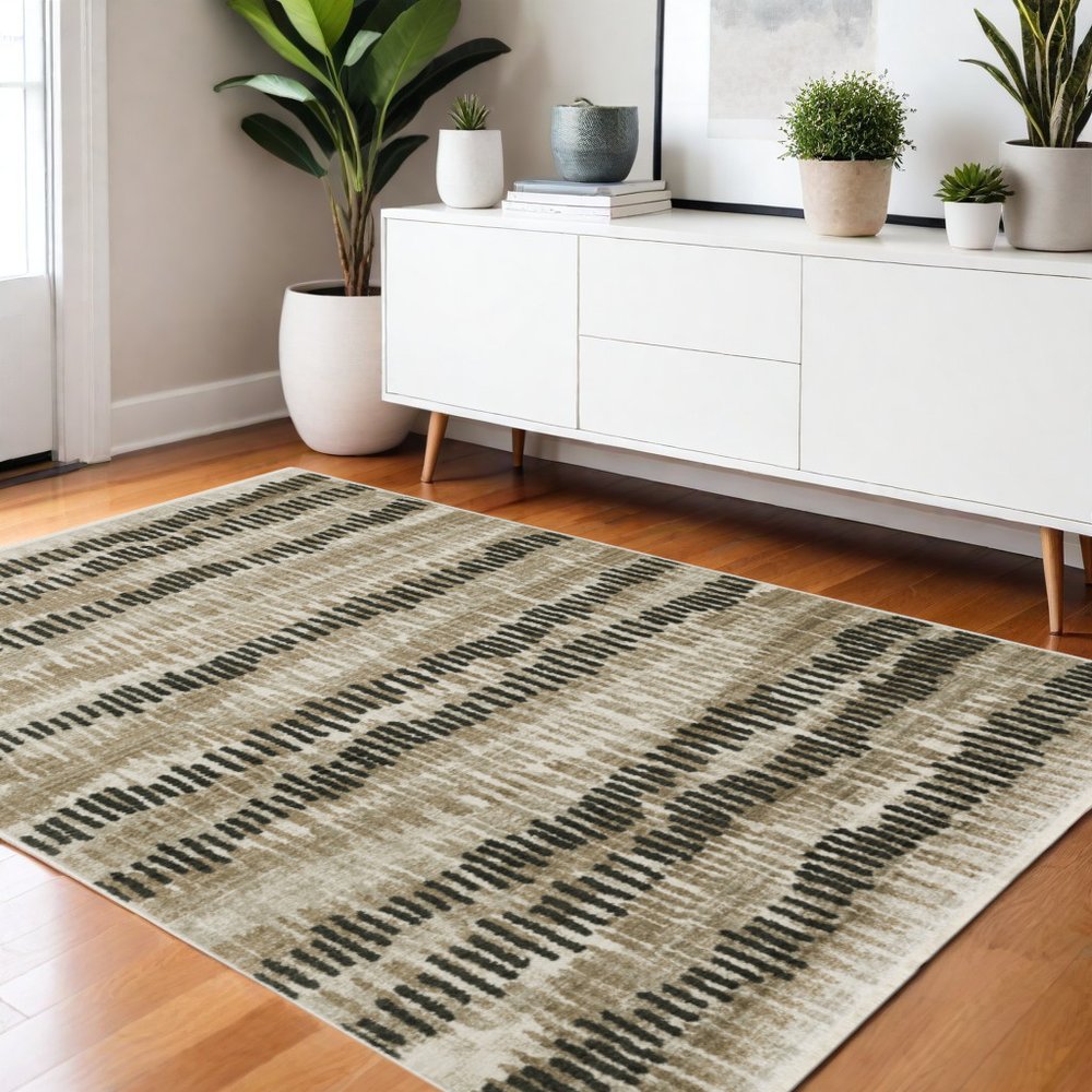 4' X 6' Beige Ivory Charcoal Brown Tan And Grey Abstract Power Loom Stain Resistant Area Rug With Fringe