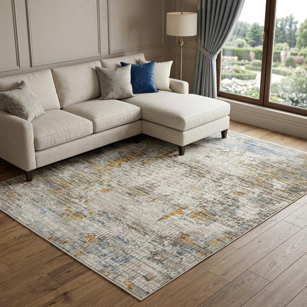 10' X 13' Beige Grey Brown Gold Red And Blue Abstract Power Loom Stain Resistant Area Rug With Fringe