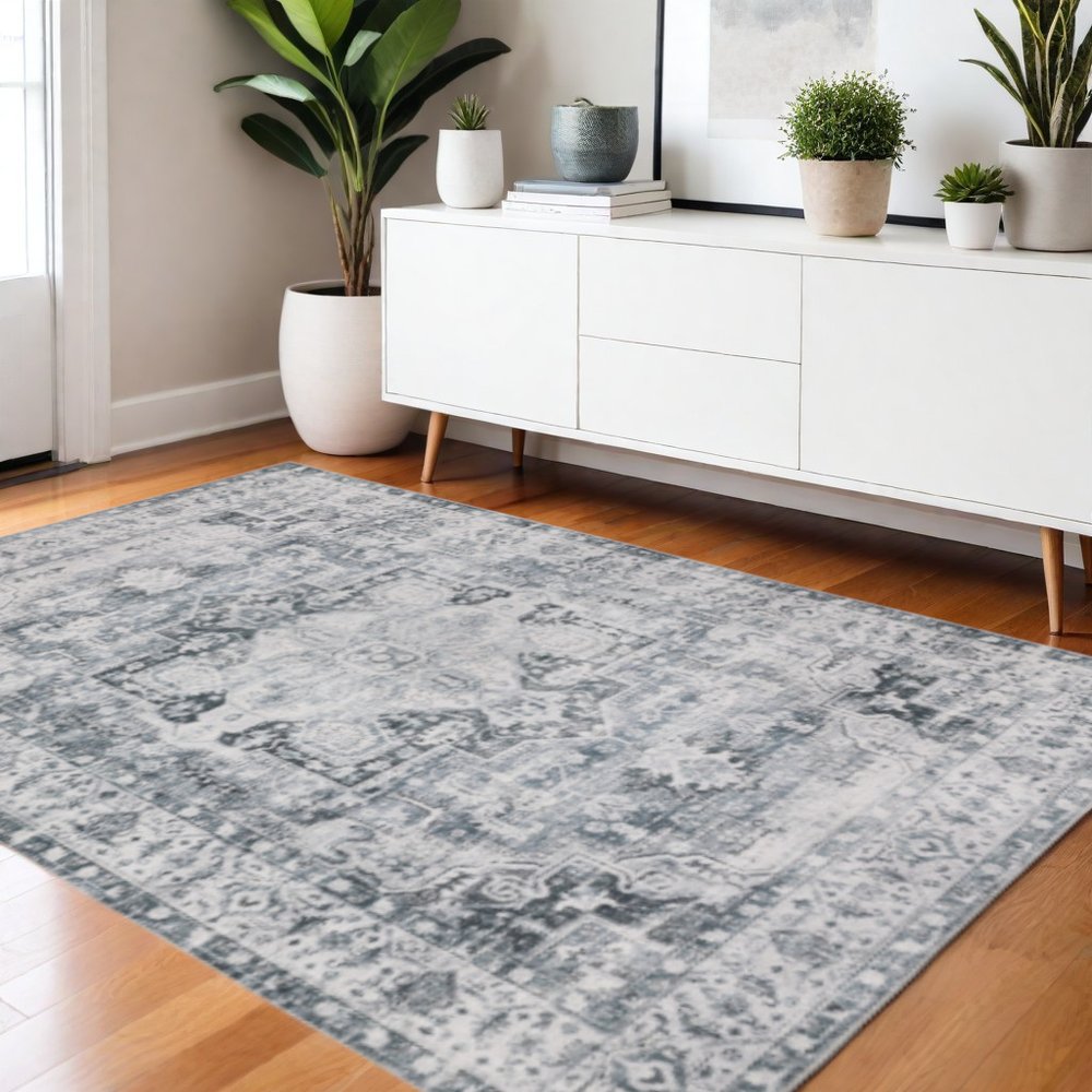 4' X 6' Navy Blue Ivory And Grey Oriental Printed Stain Resistant Non Skid Area Rug