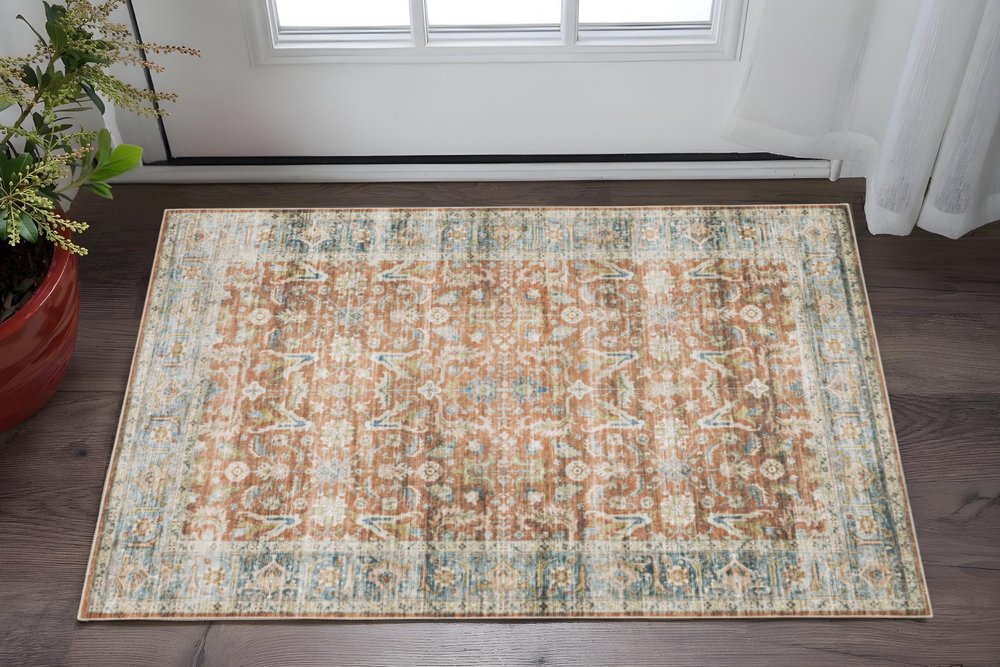 2' X 3' Rust Blue Ivory And Gold Oriental Printed Stain Resistant Non Skid Area Rug