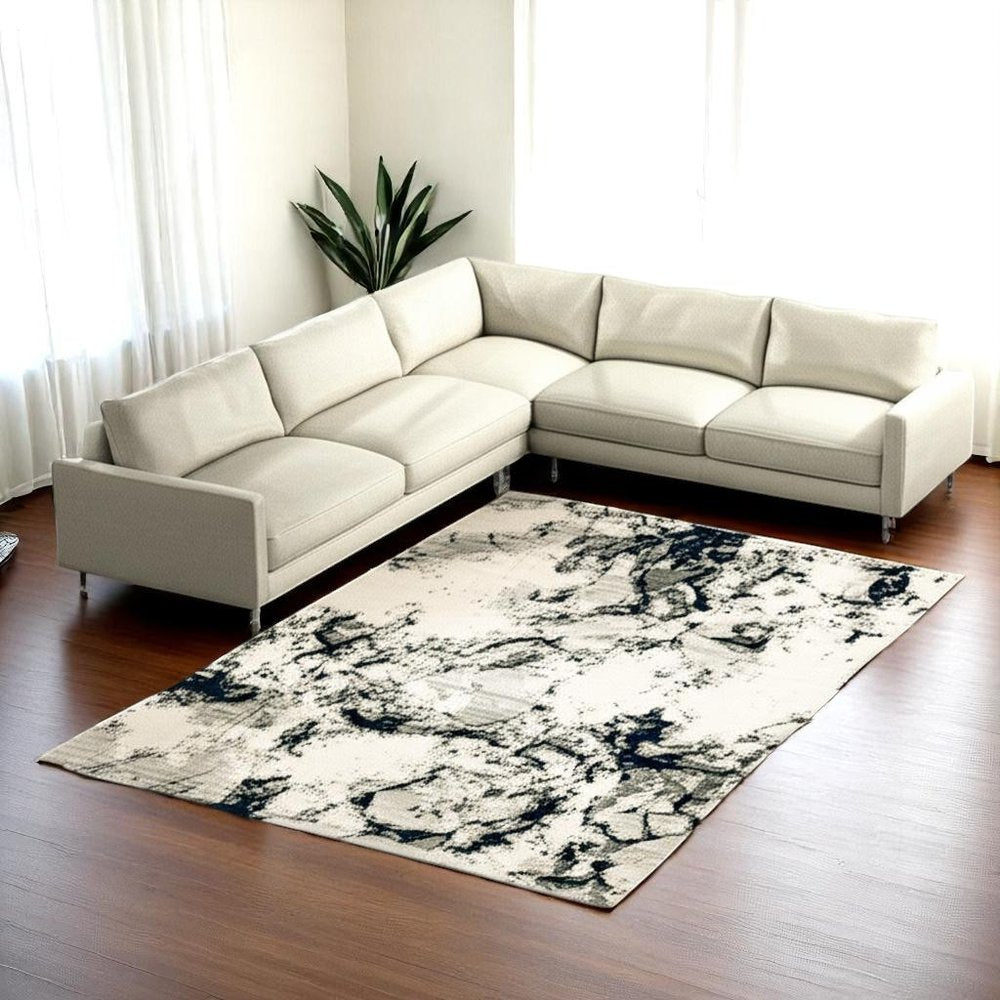 5' X 7' Gray and Black Abstract Power Loom Area Rug