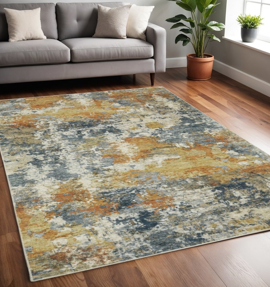 5' X 7' Teal Blue And Gold Abstract Distressed Area Rug