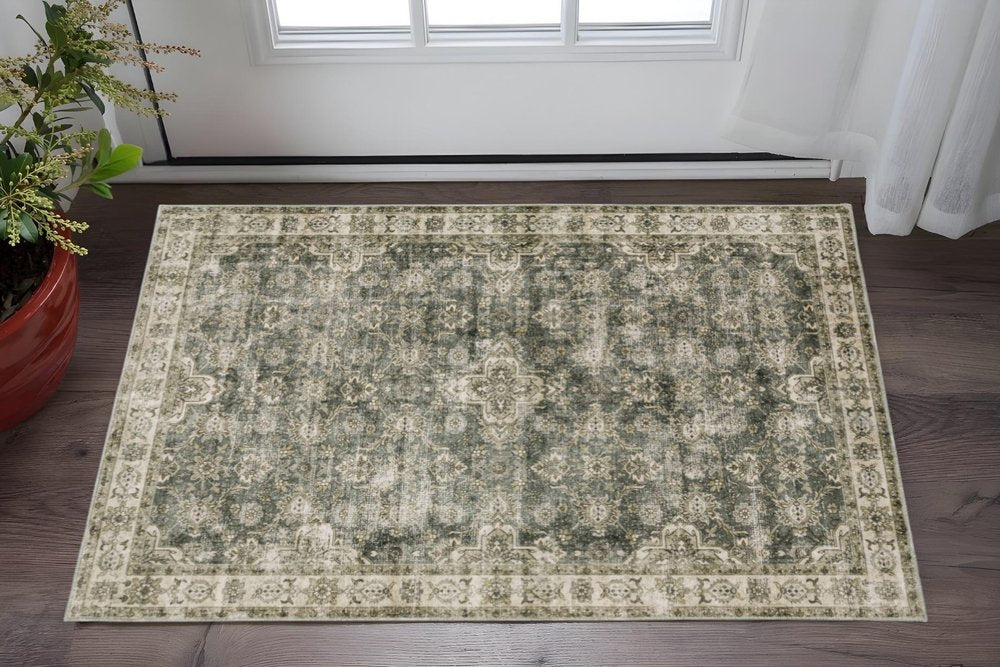 2' X 3' Ivory And Blue Oriental Printed Stain Resistant Non Skid Area Rug