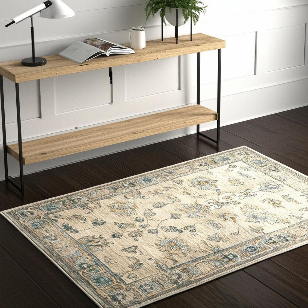4' X 6' Ivory Blue Gold And Grey Oriental Power Loom Stain Resistant Area Rug