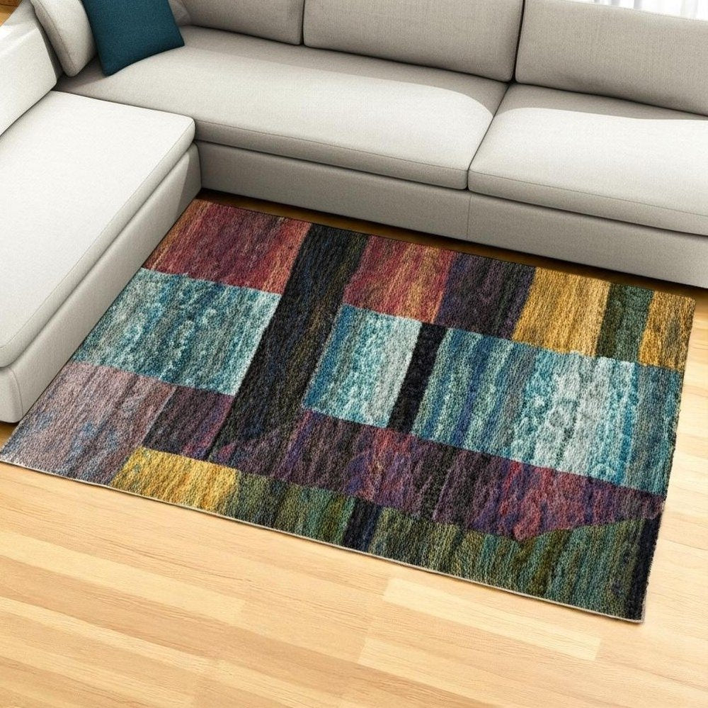 7' X 10' Purple and Red Geometric Power Loom Area Rug