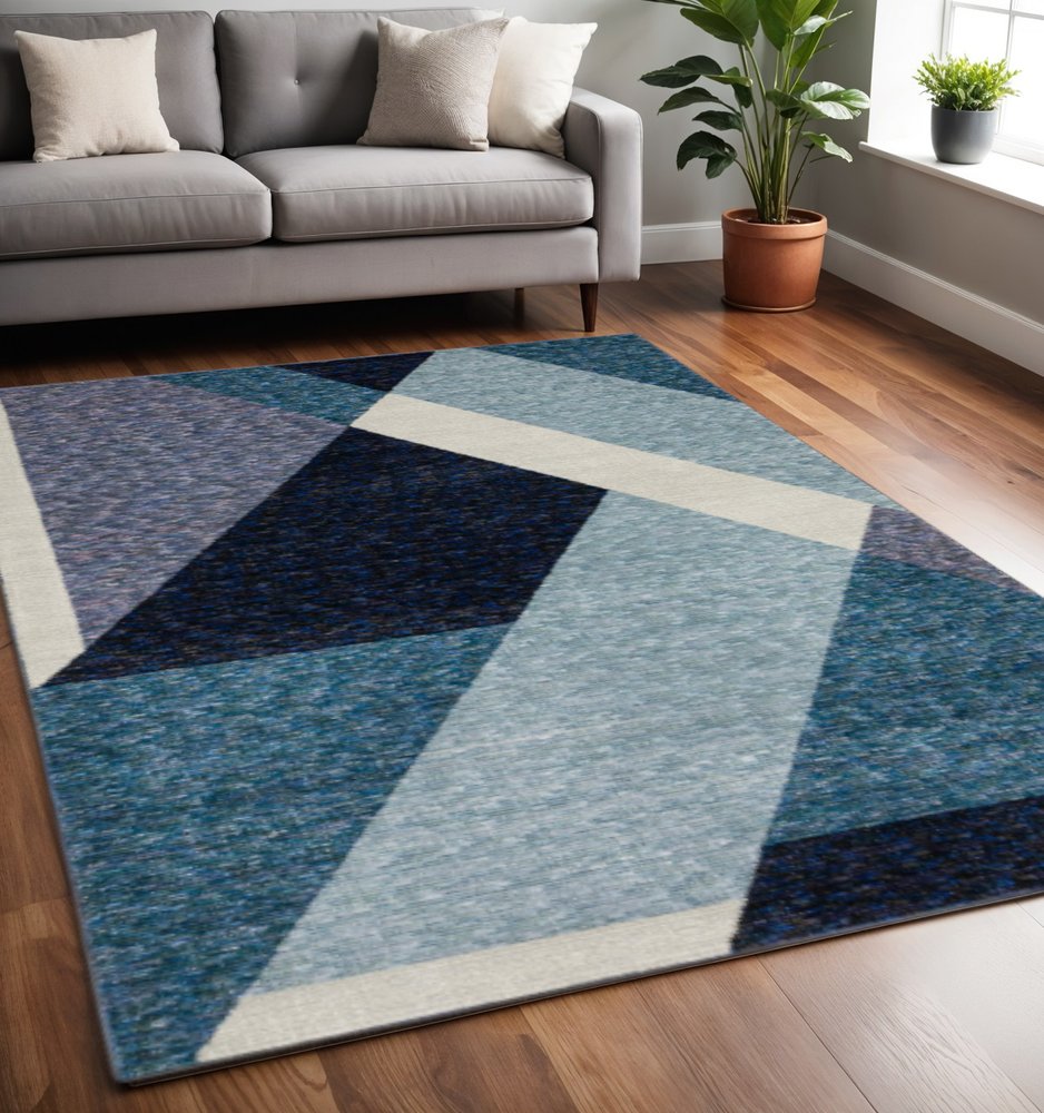 7' X 10' Blue Purple Grey and Teal Geometric Power Loom Area Rug
